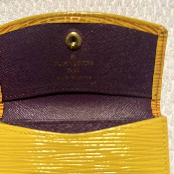 Louis Vuitton yellow coin case
